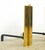 Mid Century style andirons made of tall brass rectangular panels with cast iron supports. Andirons, also known as...