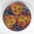 On offer is this beautifully vibrant rare plate designed by Courtney Davis. It features a gorgeous colorful triple spiral...