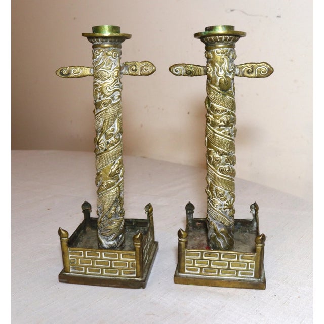 Up for sale is a very high quality pair of antique 19th century Chinese handmade brass candlesticks. These rare candle...