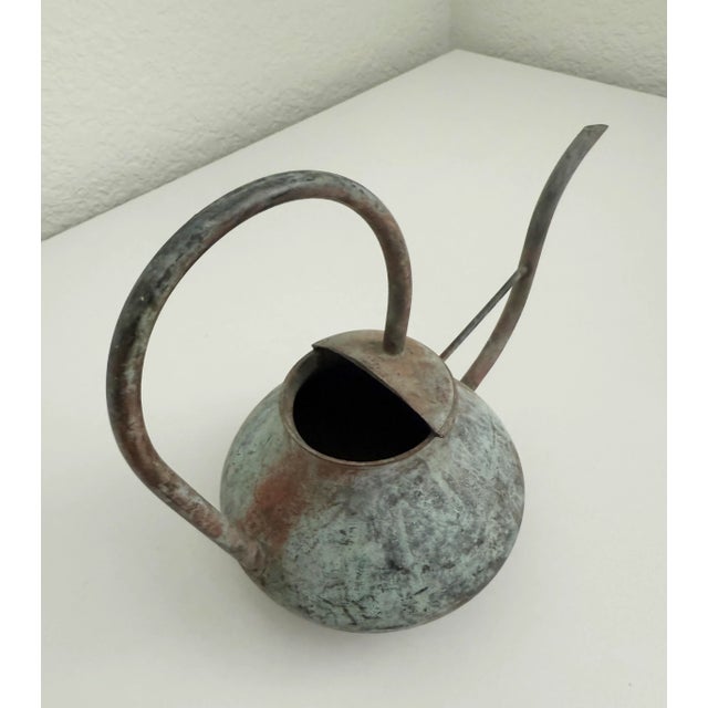 Petite, functional vintage copper verdigris plant watering can. Sculptural curves in the spout and handle make this a...