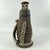 This early 20th-century Ethiopian milk jug exemplifies the artistry and craftsmanship of traditional pastoral communities...