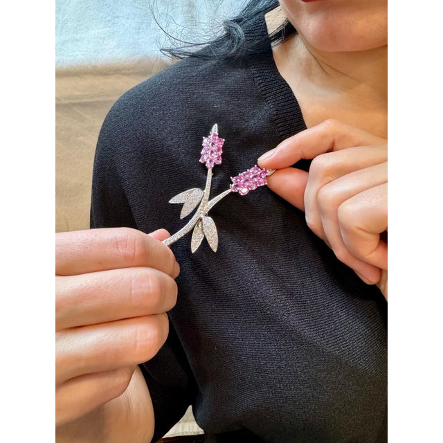 This stunning vintage 1960s lapel brooch of opulent aesthetic and unmatched sophistication depicts a very precious two...