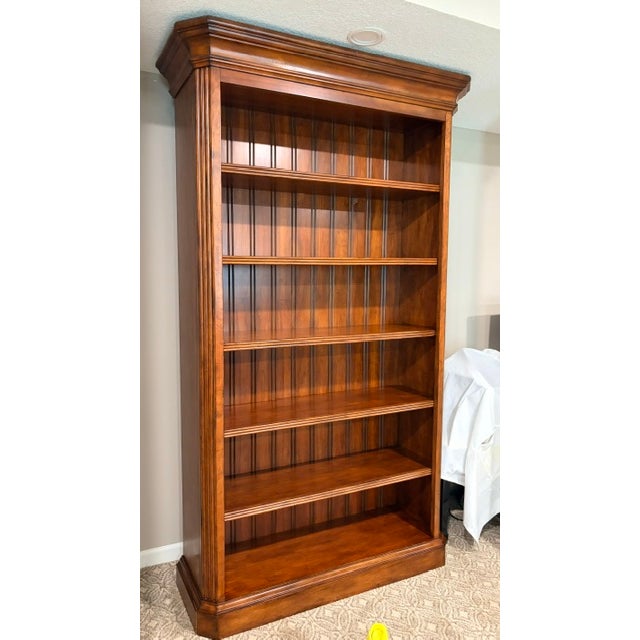This is a high-quality solid wood bookcase with elegant traditional design details. Standing 81 inches tall, 42.5 inches...