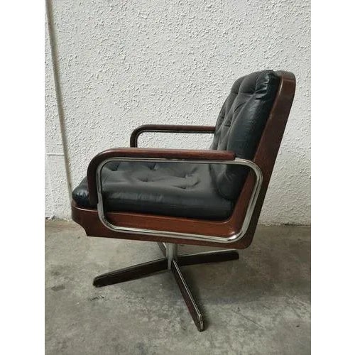 rmchair from the Spanish manufacturer AG Barcelona, ​​well-known in the 1970s for its innovative designs. It features a...