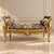 This exquisite French-style Rococo settee features an elaborately carved frame finished in gold leaf, creating an...