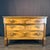 Handsome 19th century French three-drawer commode, dresser or chest of drawers featuring richly figured book matched wood...