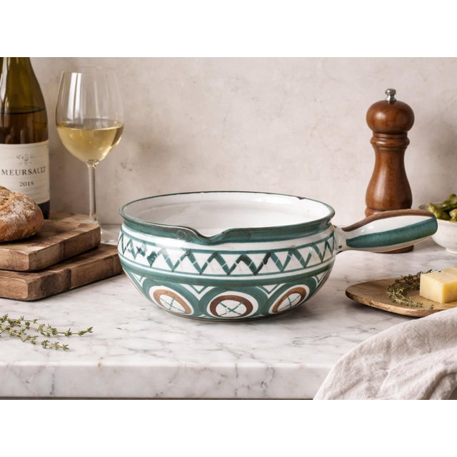 An authentic Robert Picault ceramic caquelon (fondue pot) produced in Vallauris during the postwar revival of French...