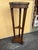 Tall mahogany pedestal table. This would make an elegant plant stand, jardiniere, or display for sculpture. The table...
