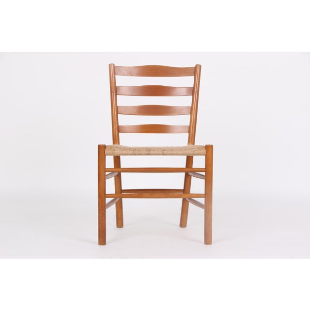 The church pew was designed in 1940 by the Danish architect Kaare Klint and was originally intended for Grundtvig Church....