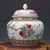 Stunning Chinese famille‑rose lidded jar decorated with abundant peaches and bats, classic symbols of longevity, fortune...