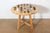 This 20th-century French game table is a charming example of mid-century craftsmanship and leisure culture. The circular...