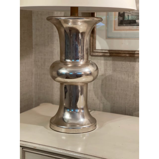 Bull Nose Cylinder Table Lamp in Mercury Glass with Natural Paper Shade.. Excellent condition and ships in original box....