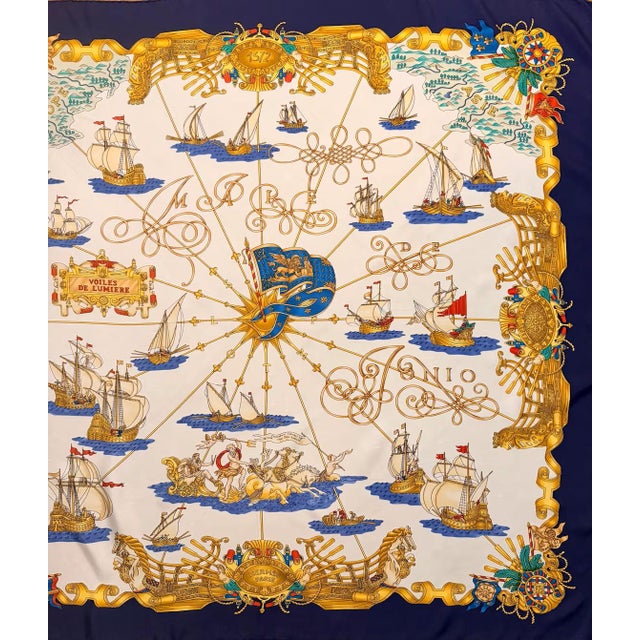HERMES VOILES DE LUMIERE silk scarf 1995 This scarf depicts numerous caravels under full sail, seemingly traversing the...