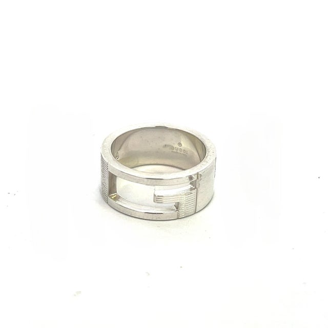 Authentic Gucci Estate Ring Size 5 Sterling Silver 8 mm height G33 This elegant Authentic Gucci ring is made of sterling...