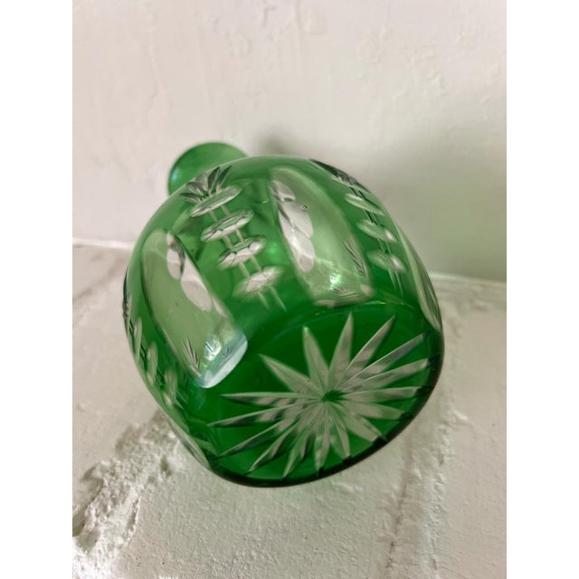 Emerald green cut-to-clear crystal bud vase / carafe. Good vintage condition.