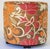 Modern Moroccan Art Deco Style pouf in bronze, red, white and red psychedelic velvet fabric upholstery in 1970s style....