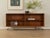 A classic sideboard by Lothar Wegner from the 1960s. High-quality teak veneer body with two shelves and new steel feet in...