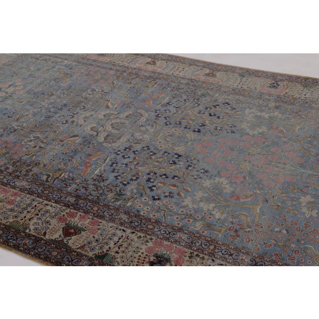 This antique 7x11 Persian runner rug is a rare hand-knotted silk piece, believed to originate from the Isfahani city of...