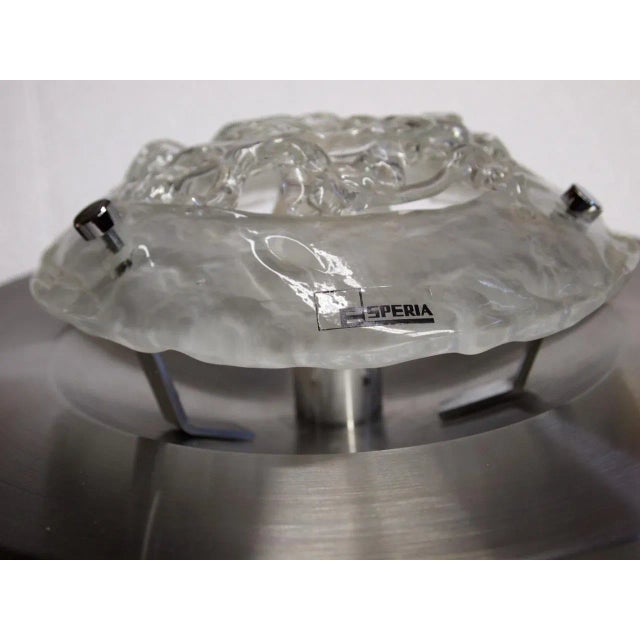 This eye-catching wall sconce, model “Pompeo”, is an original vintage piece by Angelo Brotto, manufactured by Esperia in...