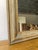 This elegant antique Louis Philippe style mirror features a unique and beautiful light verdigris patina on its wide,...