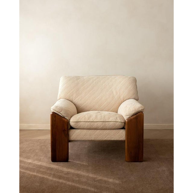 A vintage sapporo lounge chair in solid walnut and original cream textured upholstery, designed by mario marenco for mobil...