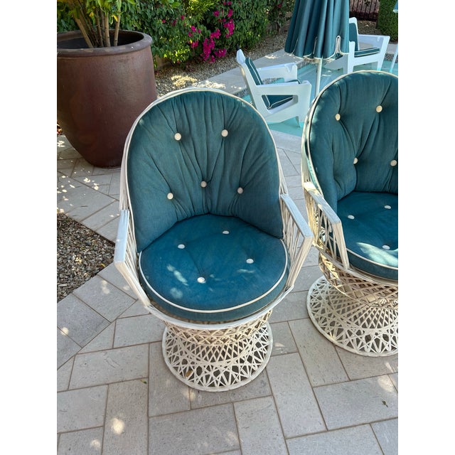 An impressive and exceptionally rare stunning complete set of eight authentic Russell Woodard spun fiberglass swivel...