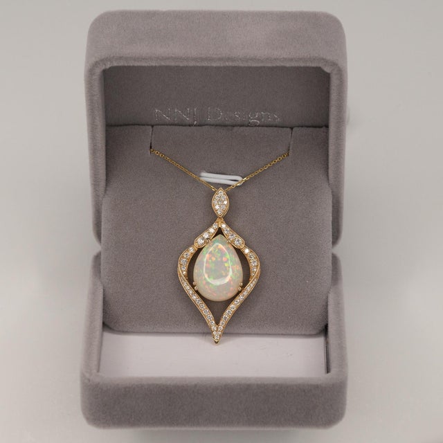 Modern Ethiopian Opal With Natural Diamond Accents: Solid 14k Gold - Pear Cut 18x13mm For Sale - Image 3 of 8