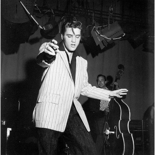 "Elvis rehearsing for Milton Berle" by Michael Ochs Archives Rock and roll musician Elvis Presley rehearsing for his...