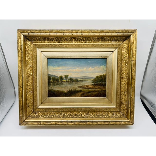 This exquisite 19th-century American School oil on board is a captivating example of the New Hampshire School, renowned...