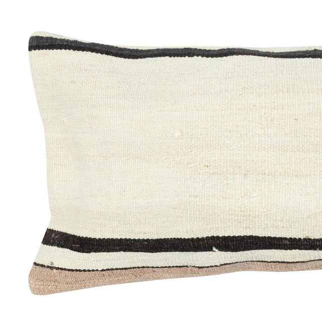 Add a touch of history and warmth to your space with this vintage handmade Turkish hemp kilim cushion cover. Crafted from...