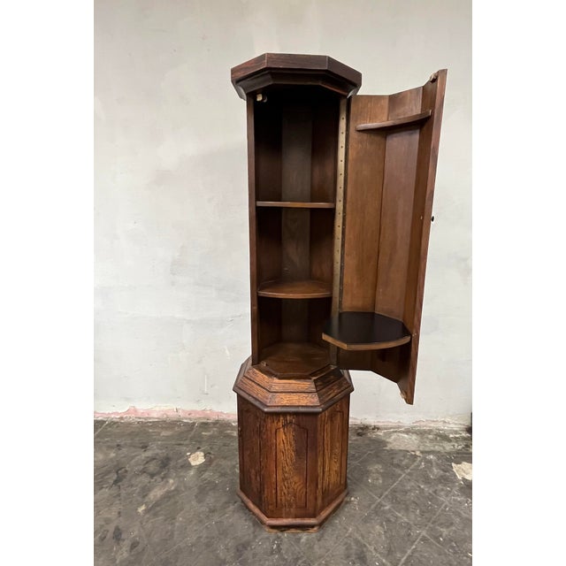 Unique fluted column bar cabinet. Iconic mid century Mediterranean design. Tall presence with upper cabinet opening to...
