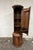Unique fluted column bar cabinet. Iconic mid century Mediterranean design. Tall presence with upper cabinet opening to...