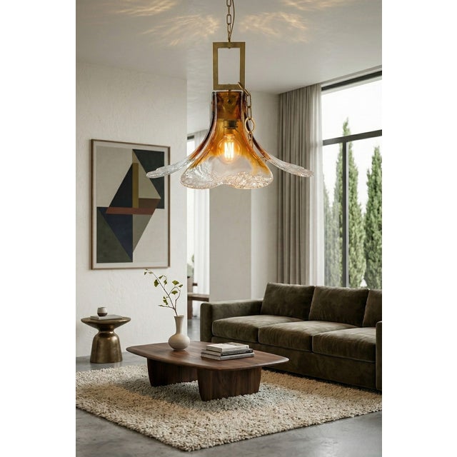 Elegant Italian vintage chandelier composed of multiple handcrafted white glass spirals suspended from a polished metal...