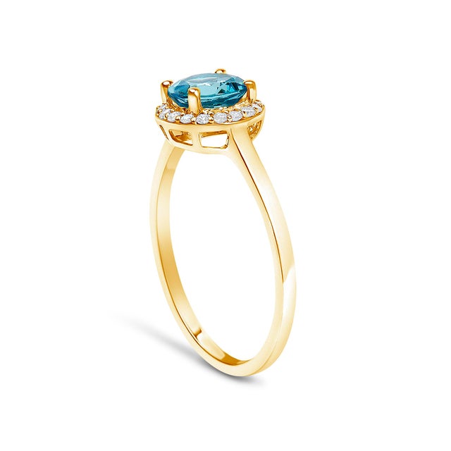 Early 21st Century 10K Yellow Gold Blue Topaz and 1/10 Cttw Diamond Halo Ring, Size 6.5 For Sale - Image 5 of 7