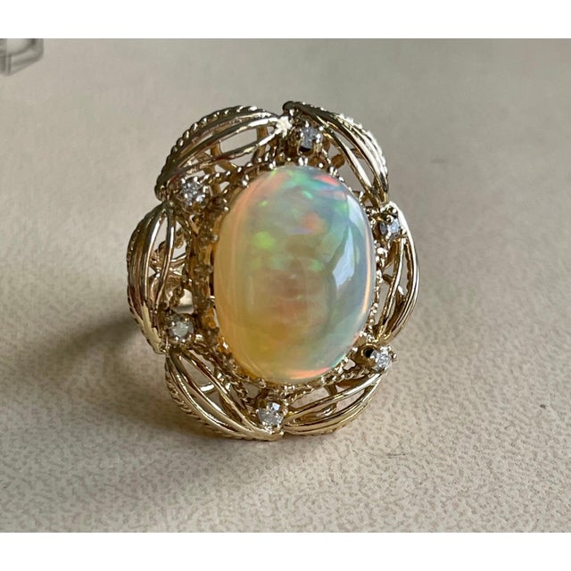 15 Carat Oval Shape Ethiopian Opal Cocktail Ring 14 Karat Yellow Gold Solid Ring For Sale - Image 17 of 18