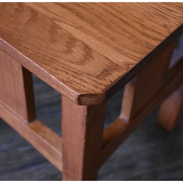 Enhance your living space with the timeless charm of the Mission Oak Slat End Table - Michael's Cherry (MC1). Designed in...