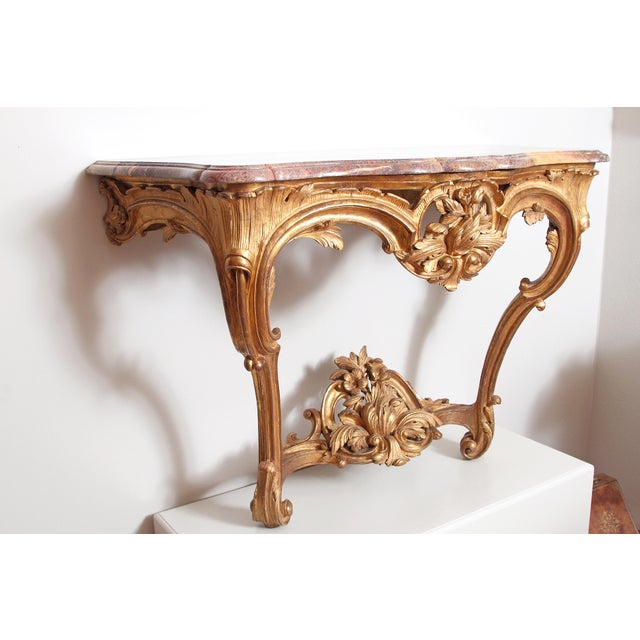 Regence Period Carved, Giltwood Provençale Console with its original gilding and Sarrancolin Marble Top France, 2nd...