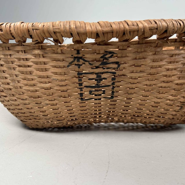 Decorative set of traditional Japanese baskets from the 1940s. Dimensions: height 18 cm, diameter 50 cm. The wicker...