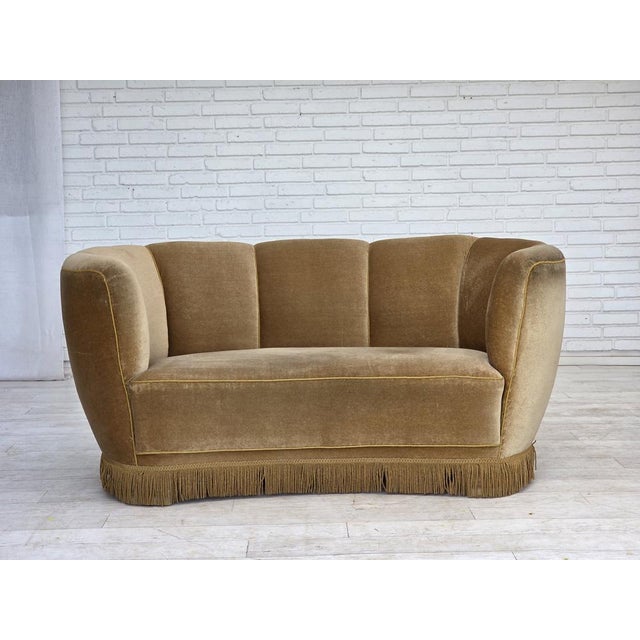 1960s, Danish "Banana" 2-seater sofa. Green furniture velour, brass springs in the seat, oak wood legs. Original good...