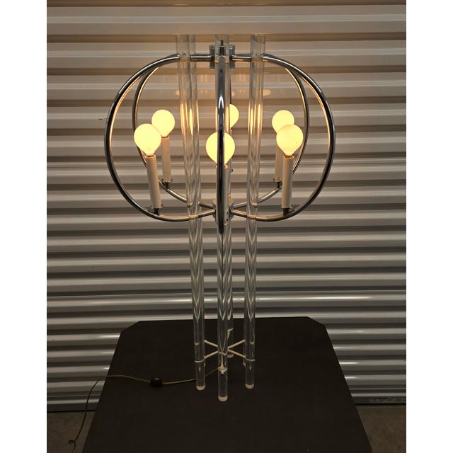 Here's a beauty you won't see often. This table lamp is by Charles Hollis Jones. It features lucite and chrome. There is 1...