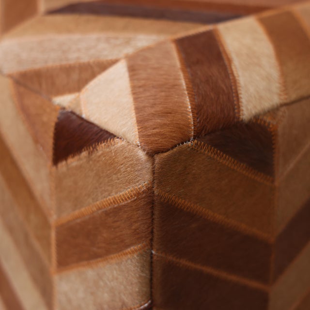 "Warm, sculptural, and effortlessly refined, this handmade cowhide leather pouf brings a rich, sun-toned presence to...