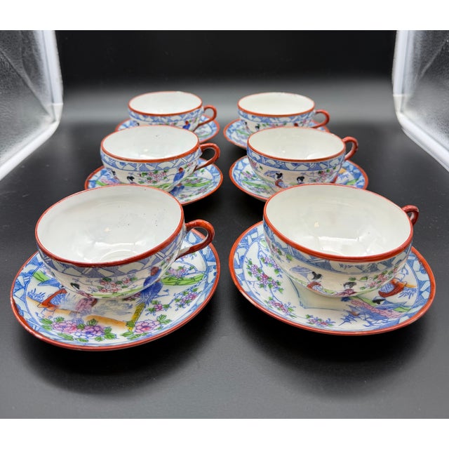 Vintage Japanese tea set from the early 1900s, produced in the Hizen area, including a teapot, creamer, sugar bowl, 6...