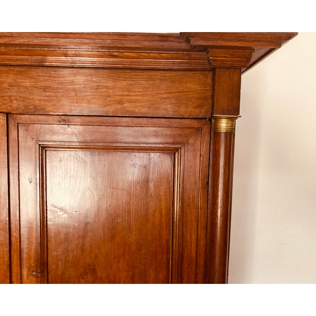 Antique French Empire Armoire Walnut, Columns to Either Side Front With Bronze Gilt Mounts Also Gilt Bronze Key Hole For Sale - Image 12 of 12