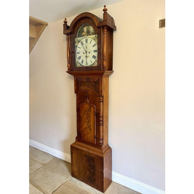 Fine quality antique 19th Century mahogany arch dial long case clock, having a quality antique Victorian long case clock...