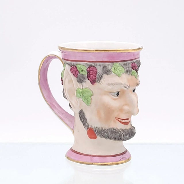 An English porcelain ware "Bacchus" cup. These are first seen in the 18th century; this one probably is mid-to-late 19th...