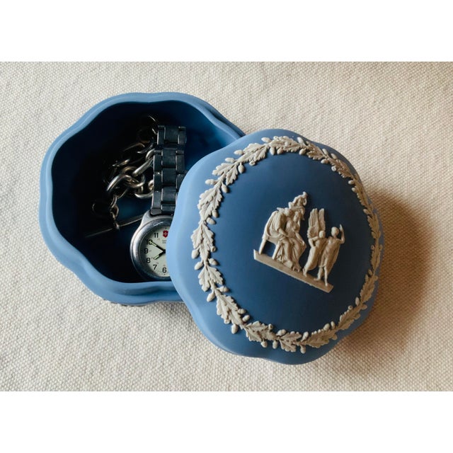 ….A stunning example of Wedgwood's most refined jasperware craftsmanship, this impressive scalloped dresser box was...