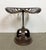 Vintage industrial height adjustable swivel chair from 1950s. An old tractor seat mounted on an iron construction....