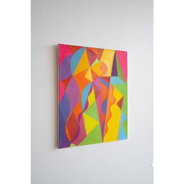 Geometric abstraction paired with a rainbow of colors creates a striking work that can make a statement in any room.