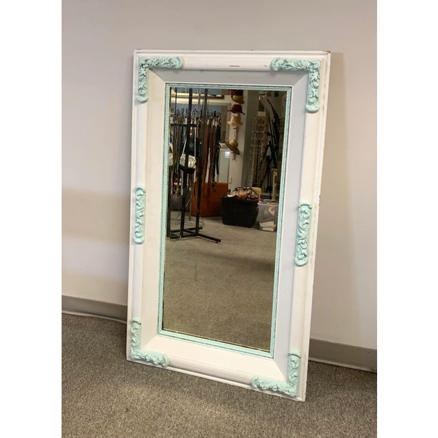 Very large 50.5" ornate antique mirror with its original beveled glass. Someone took the liberty of painting this piece...