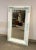 Very large 50.5" ornate antique mirror with its original beveled glass. Someone took the liberty of painting this piece...